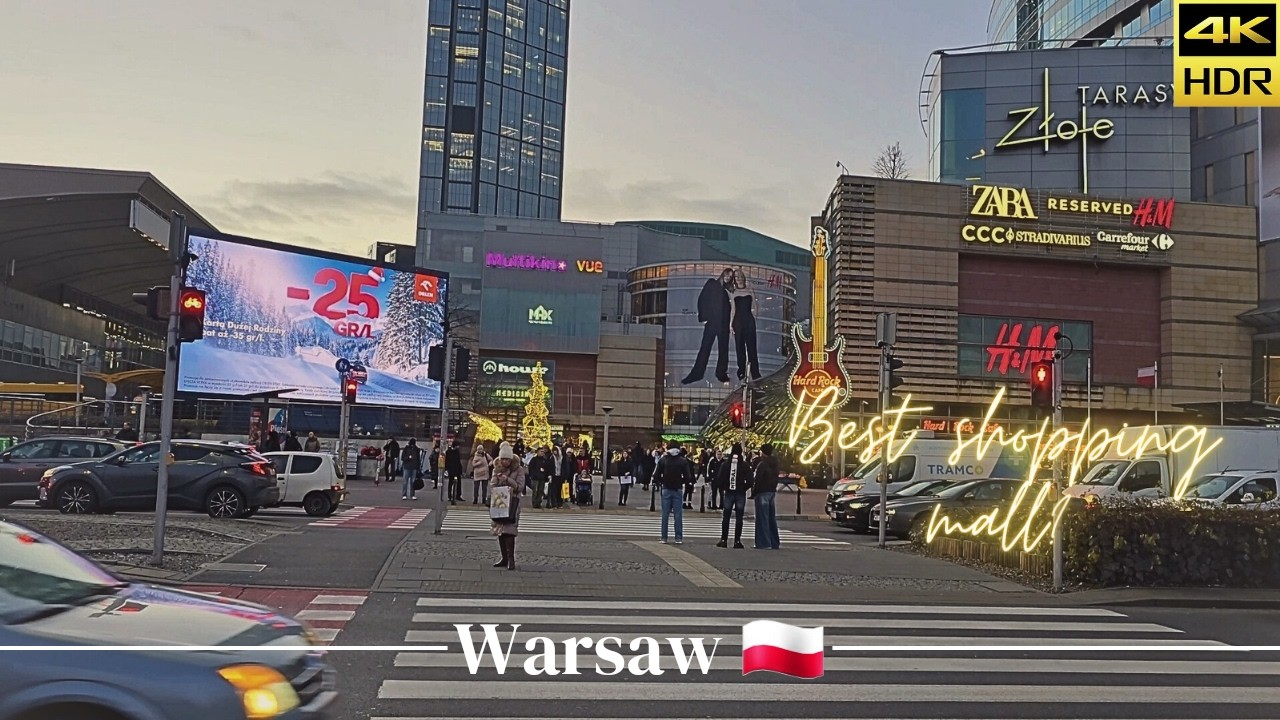 life in Poland The largest and best shopping mall: Złote Tarasy. Shoppers bying Xmas gifts. 4K HDR