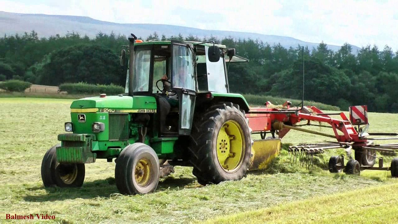 Baling and Lifting for Silage, Raking with John Deere 2140.