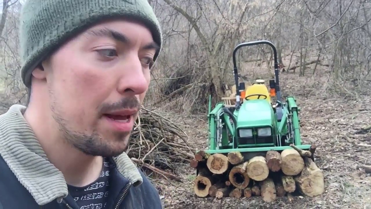 John Deere 4010 compact Tractor hauling firewood
