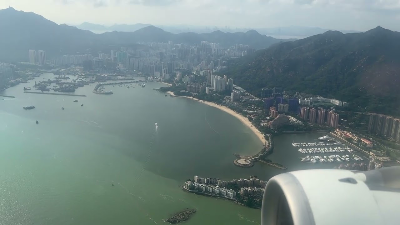 飞机入境香港，飞跃香港城市上空，直到落地香港机场#香港天空 ＃飞机入境香港 ＃云层上的风景 ＃飞机上的美景 #飞行视角