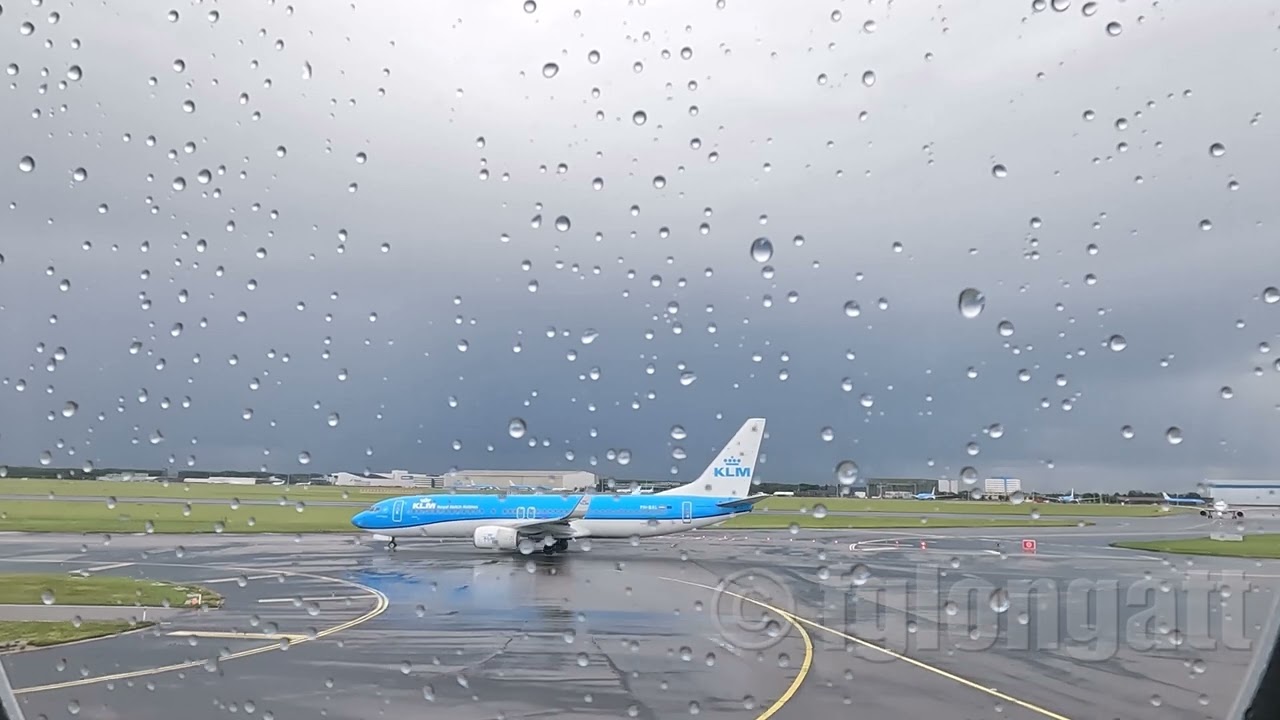Rainy Morning Take off from Amsterdam AMS  Passenger Seat POV in Cloudy Skies