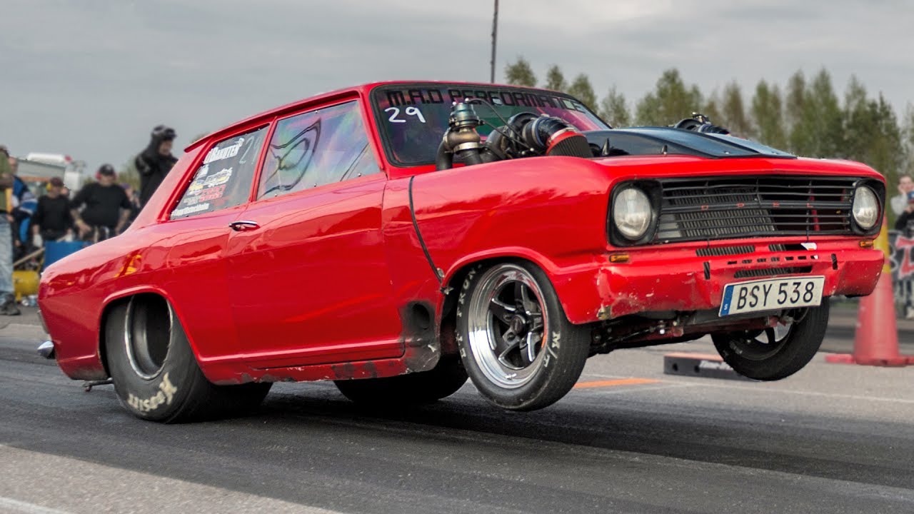 Turbo Opel SWITCHES LANES Doing a Wheelie…Guy is CRAZY!