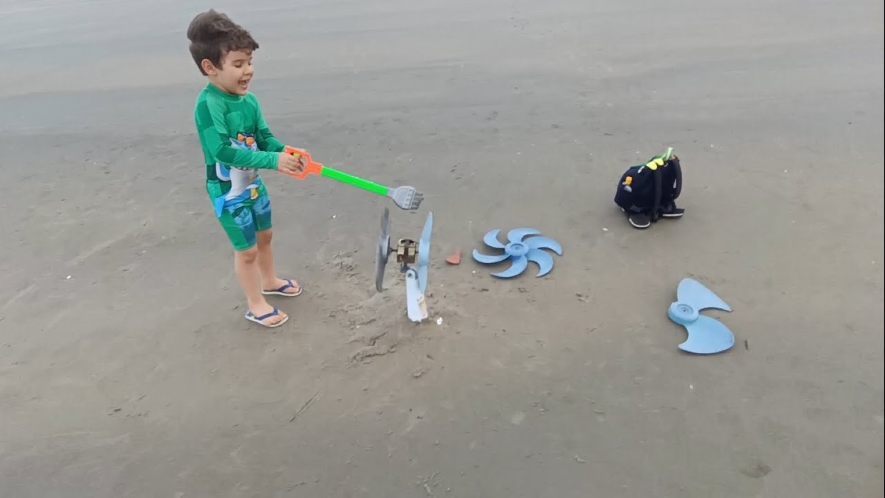 Ventilador na praia, muito vento.