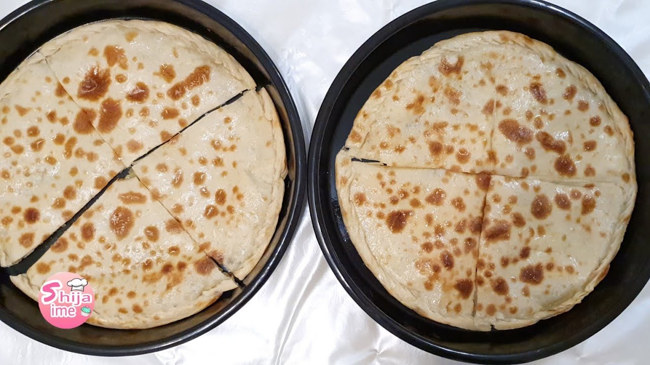 Pite te shpejta dhe te holla me nga dy petë | Te mbushura me qepe te reja | Shija ime