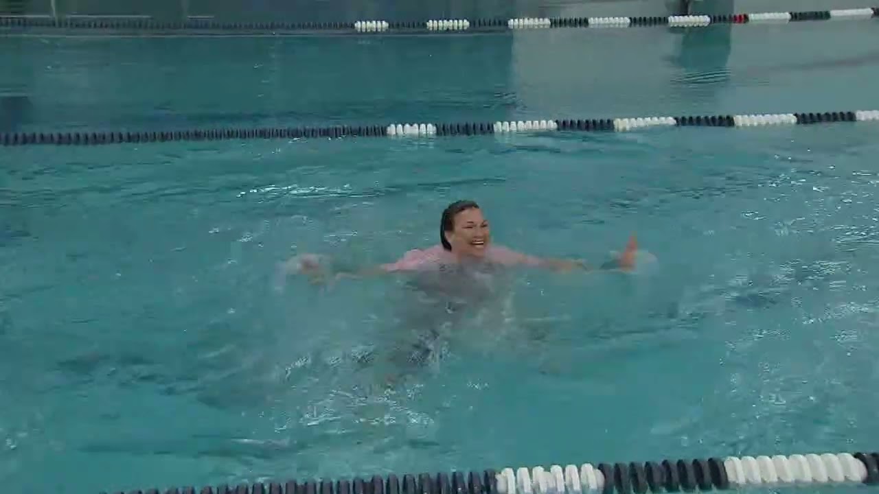 Suburban principal lets students push her into pool after winning ABC7 Friday Flyover