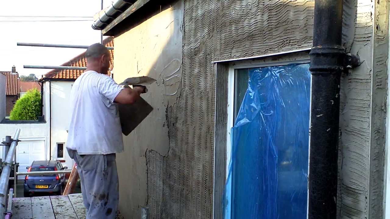 Plastering sand and cement rendering