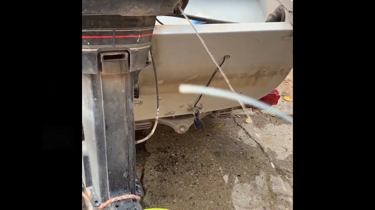 How to unclog the tell-tale on an outboard motor. Outboard won&rsquo;t pee.