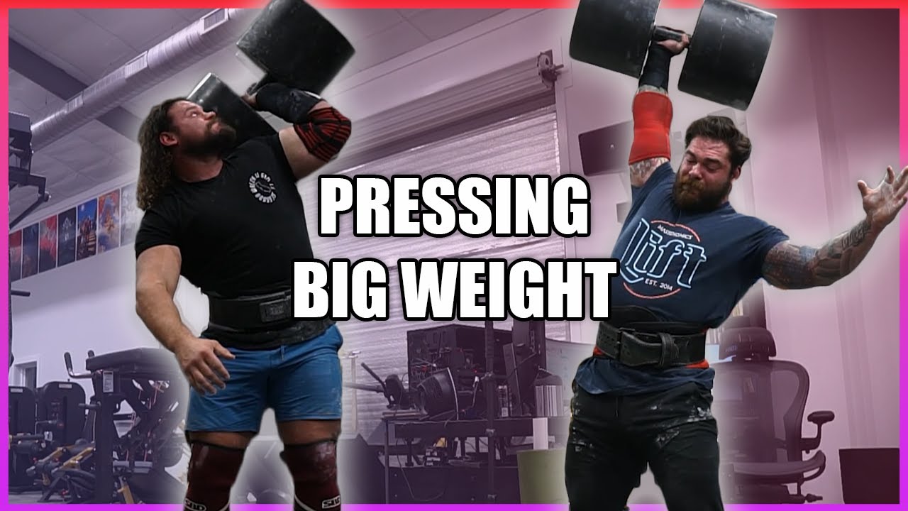 Pressing weight Overhead with World Strongest Man Martins Licis At Jujimufus Gym Home