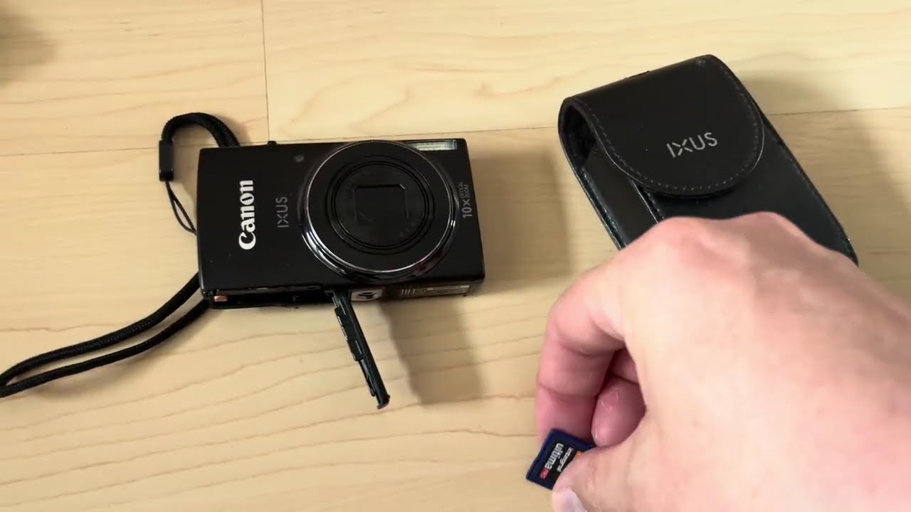 Canon Ixus 157 HD 10x optical zoom lens old digital camera black charger compact shooting