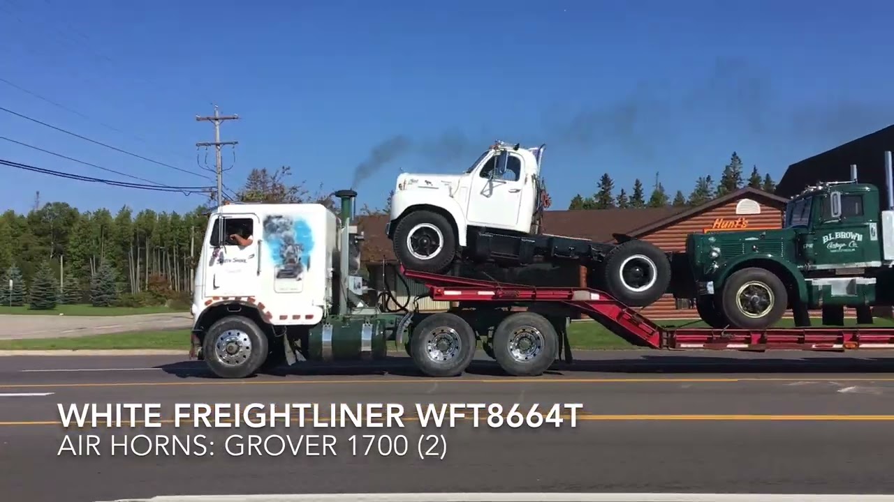 Trucks leaving the 25th Annual Richard Crane Memorial Truck Show
