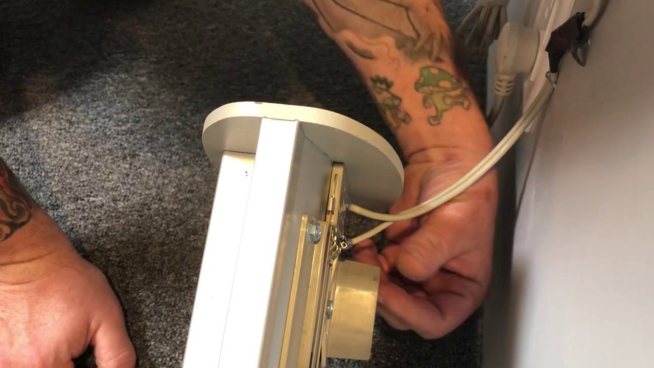 Connecting the charger cable to rail for Bruno Elan and Elite