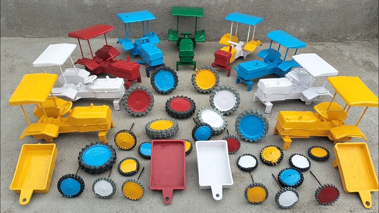 Mini white colour Mahendra tractor frent and back tyres fitting and moving tractor video 