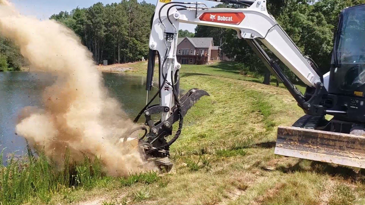 Mowing pond dam with Construction attachments 42