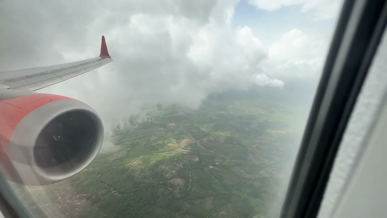 Landing at Manohar International airport , Mopa , Goa in monsoon | Akasa
