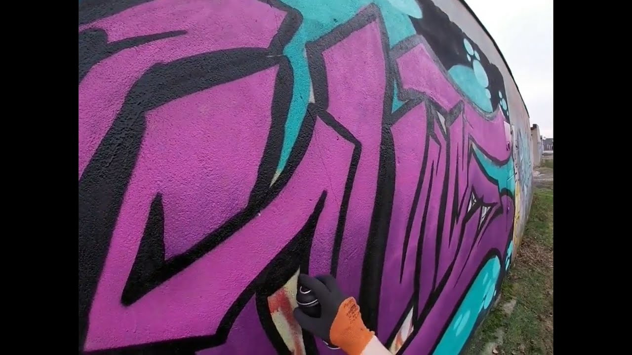 Violet piece on garage wall  (by Graffiti Production)