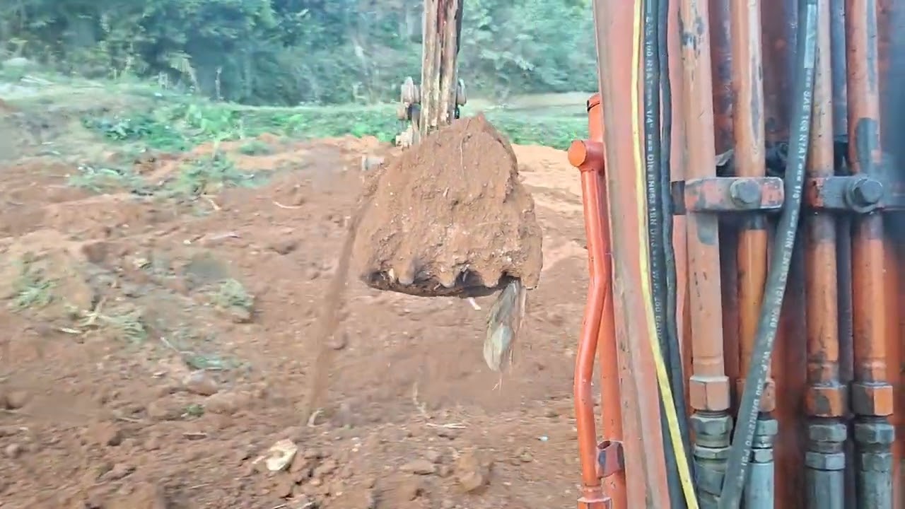 Máy xúc san ruộng 