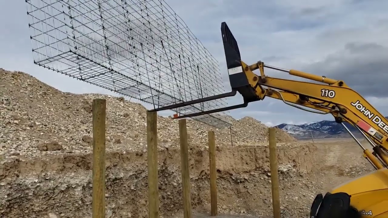 Step 10A - Installing completed gabion baskets for your pit greenhouse walls