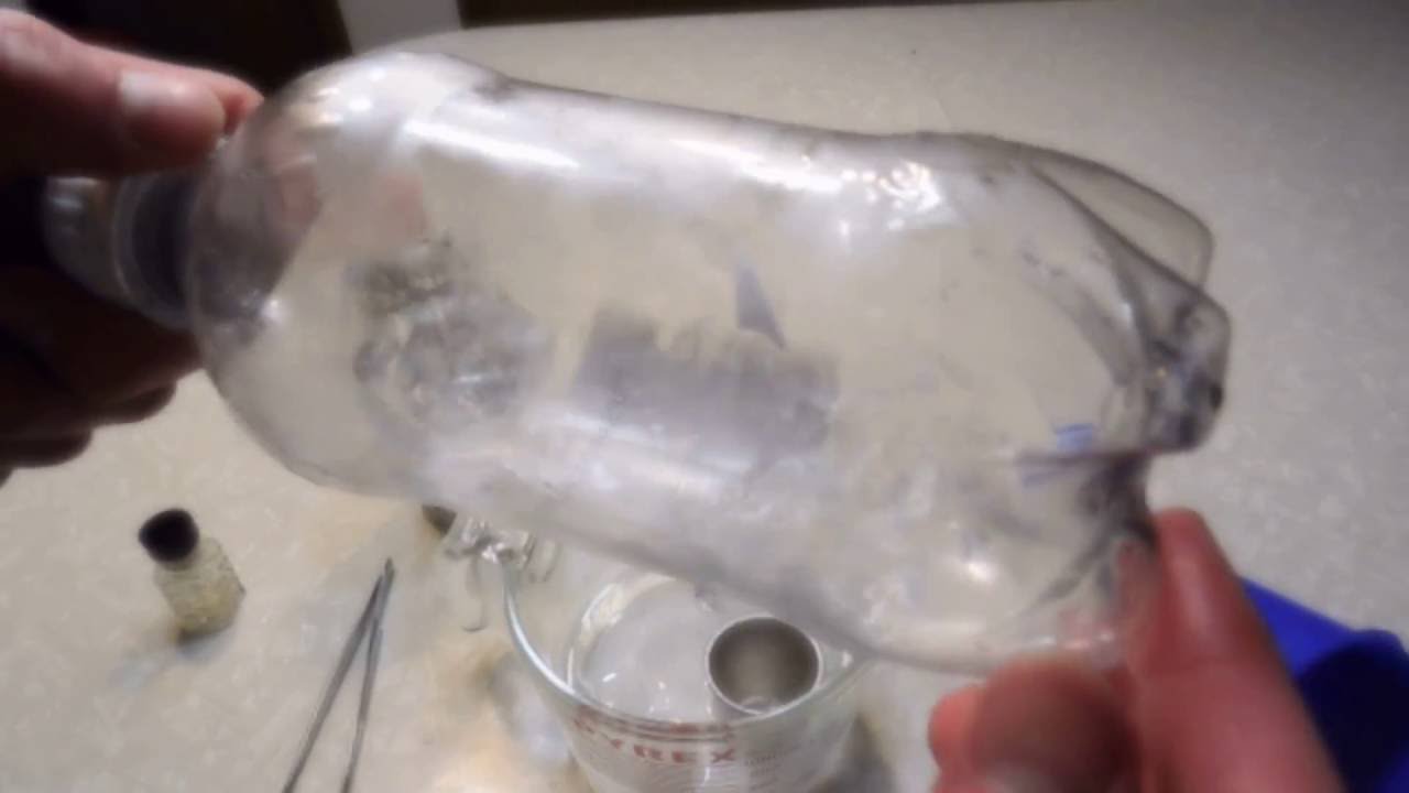 Liquid Butane Poured and Stored in a Soda Bottle