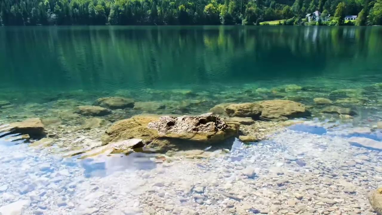 Relaxing 4k Video Mountains Surrounding Glistening lake