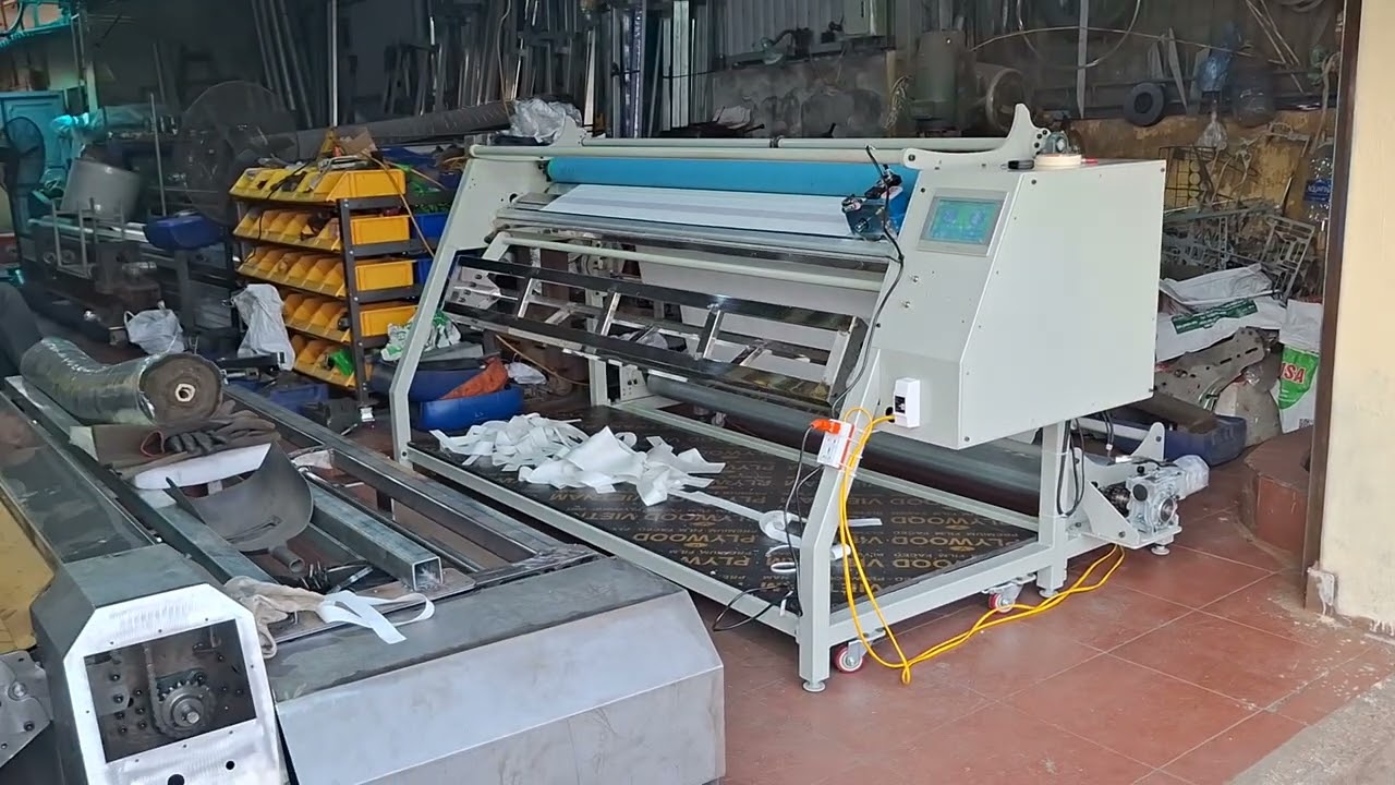Máy xả vải + máy cắt vải tự động bằng cơm .p3