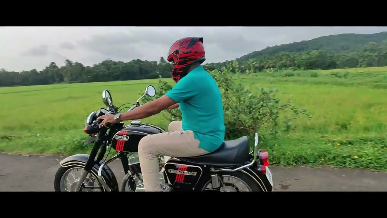 Vintage 1987 Yezdi riding through Kerala's scenic landscapes after restoration