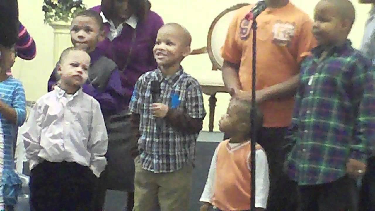 Caleb singing in the choir at church