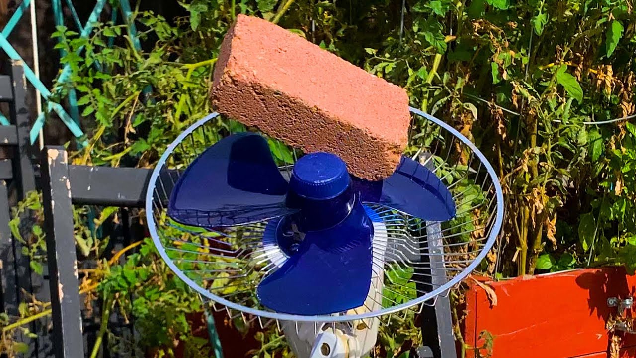 Vintage Blue Desk Fan Destruction