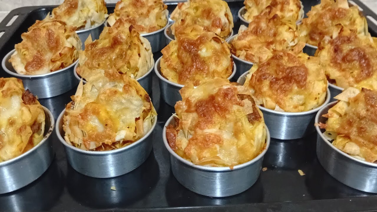ميني بسطيلة الحوت ( الكلمار)  بطريقة مختلفة👌معمرها تخطاك يسلآم🤤😍 