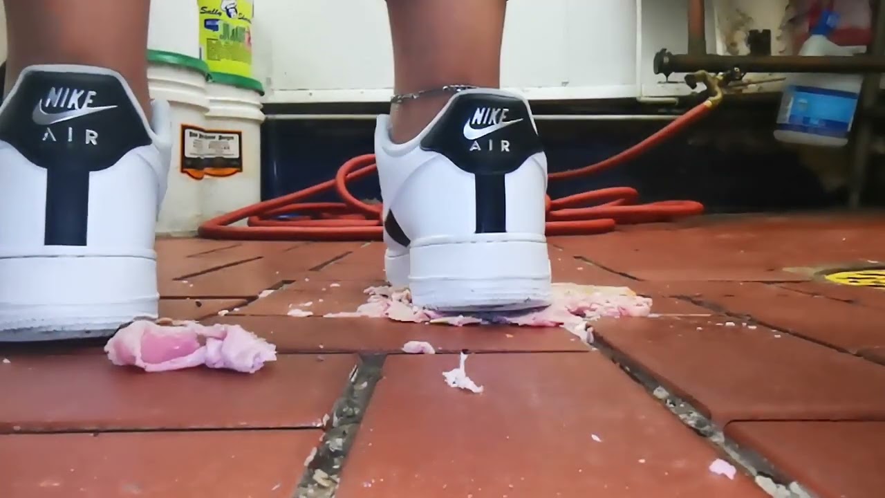 (male) Nike sandwich crush at work