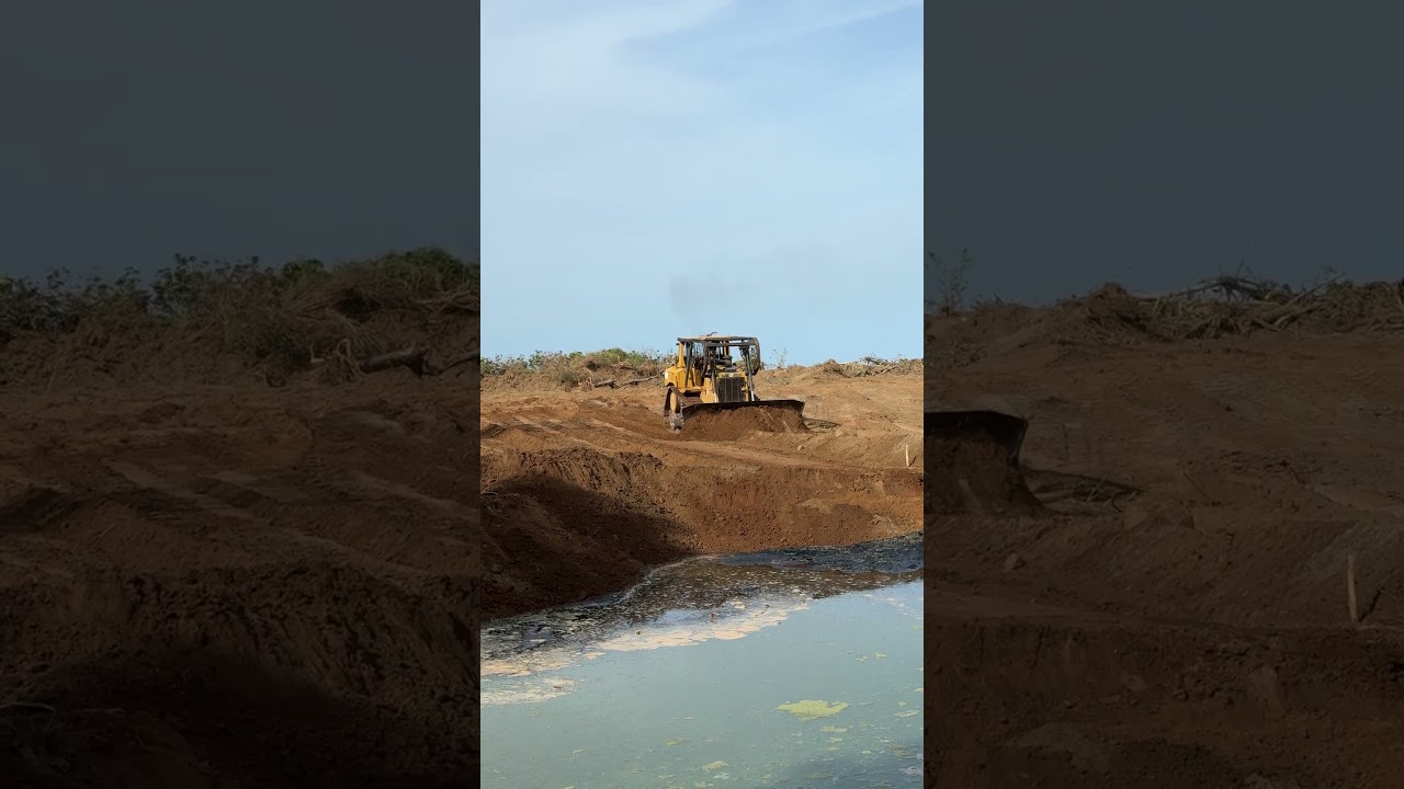 Operator of the D6R XL Bulldozer in Leveling the Ground with Precision