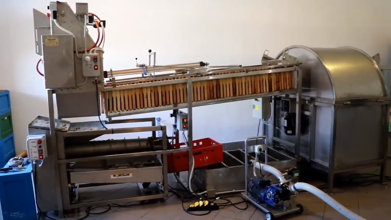 Automatyczna linia do odsklepiania plastrów i wirowania miodu Konigin