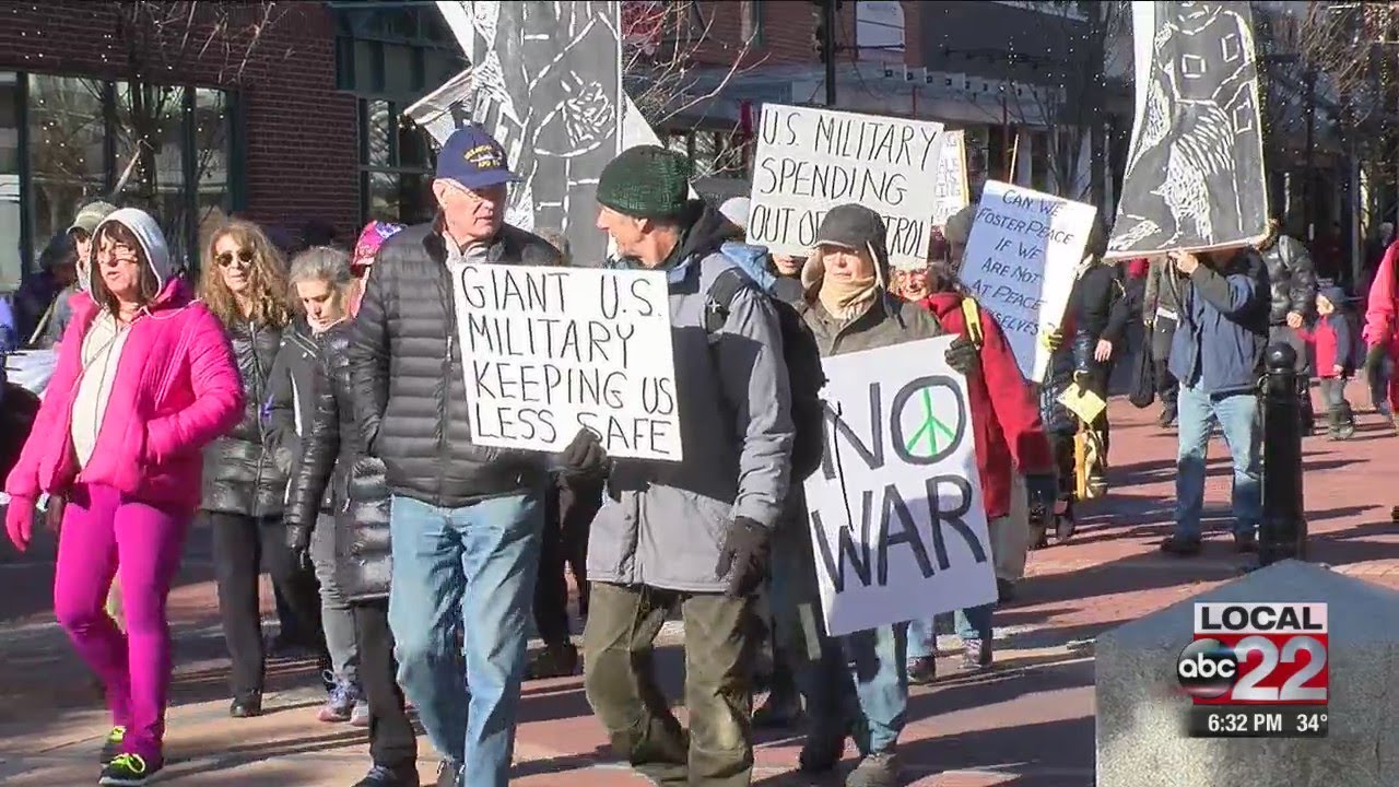 Veterans and activists march for peace on 100th anniversary of Armistice Day