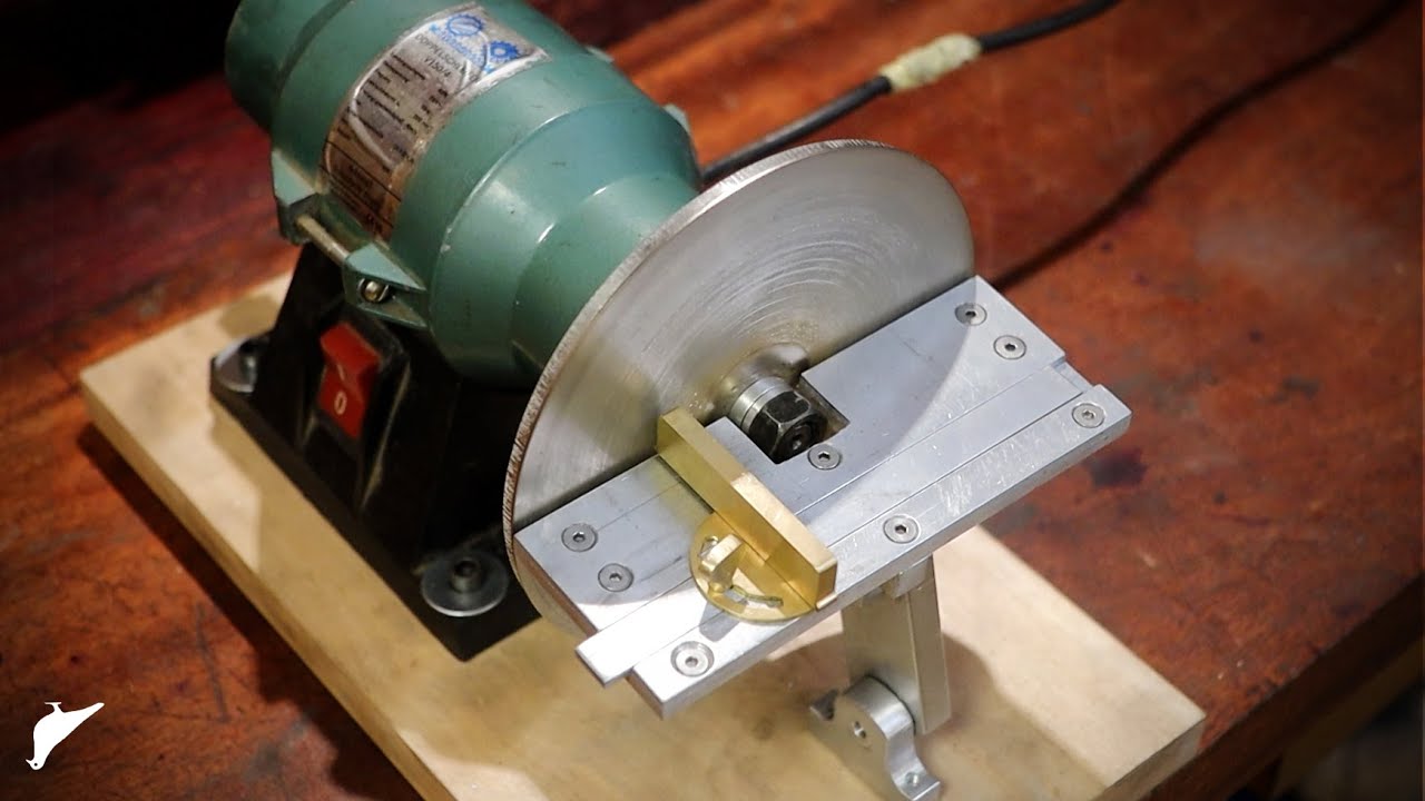 I mounted a diamond wheel on a bench grinder and made a custom tool rest for it