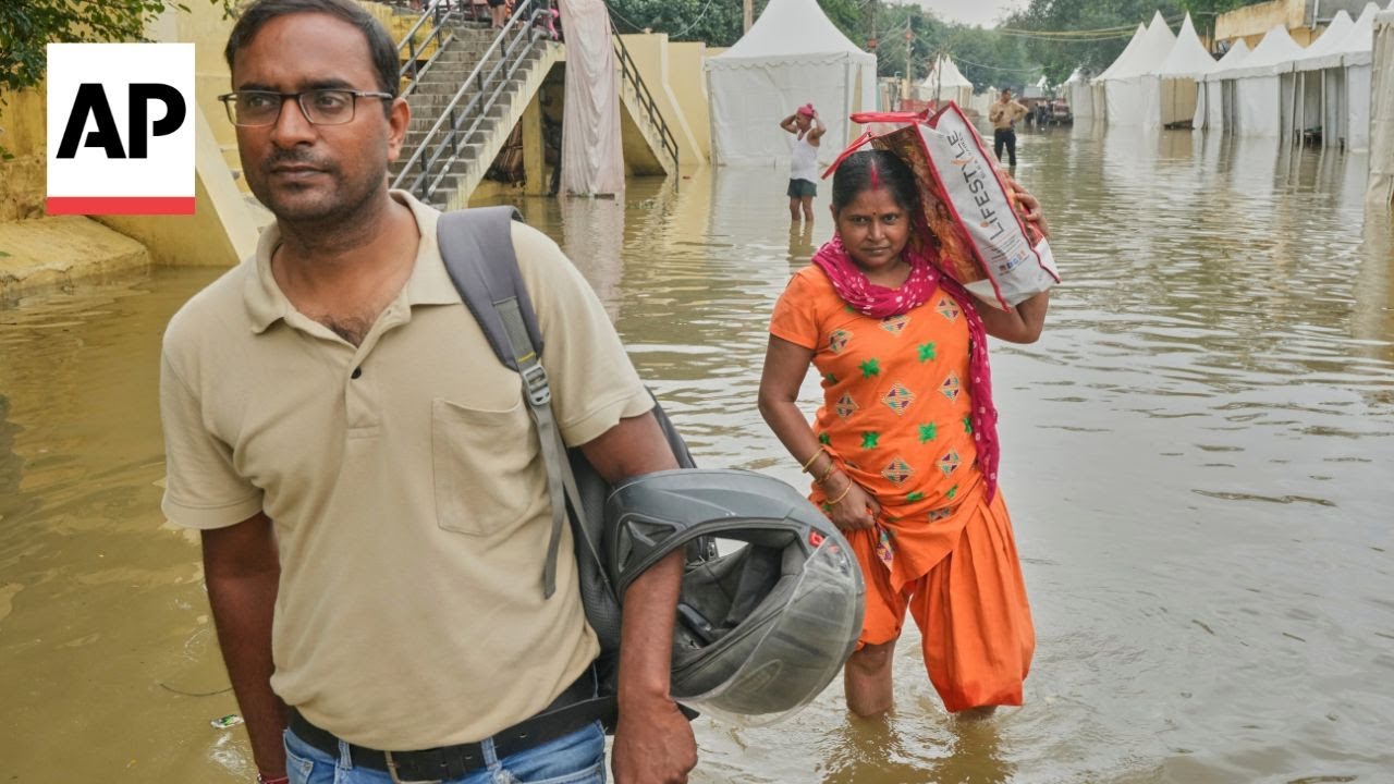 New Delhi family seeks relief from some of the worst flooding in northern India in decades
