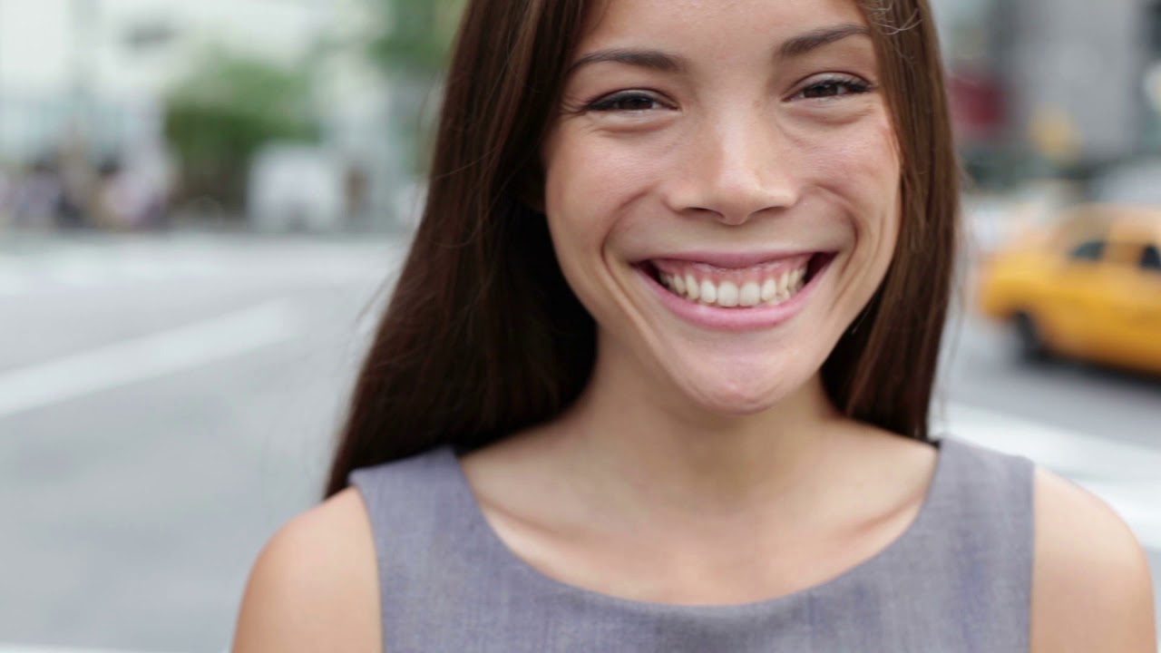 Woman On Street Smiling | free Video loop