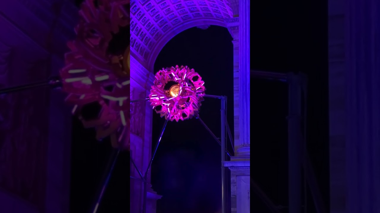 Olympic cauldron in Milan - dramatically suspended beneath the Arco della Pace, or Arch of Peace