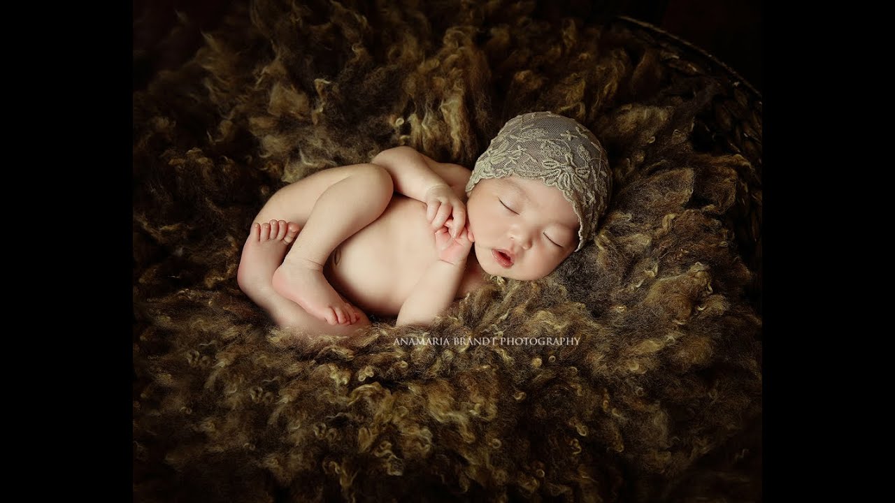 Baby Mikayla and her family photographed in studio by Ana Brandt