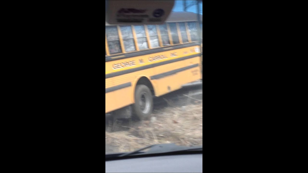 School bus get stuck in a ditch with kids on board