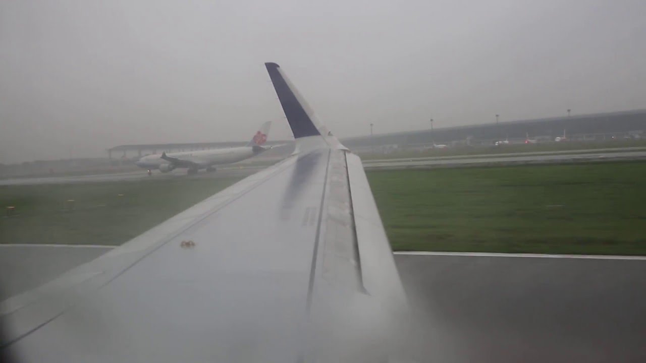 Batik Air PK-LAK wet morning takeoff from Soekarno-Hatta Airport in Jakarta