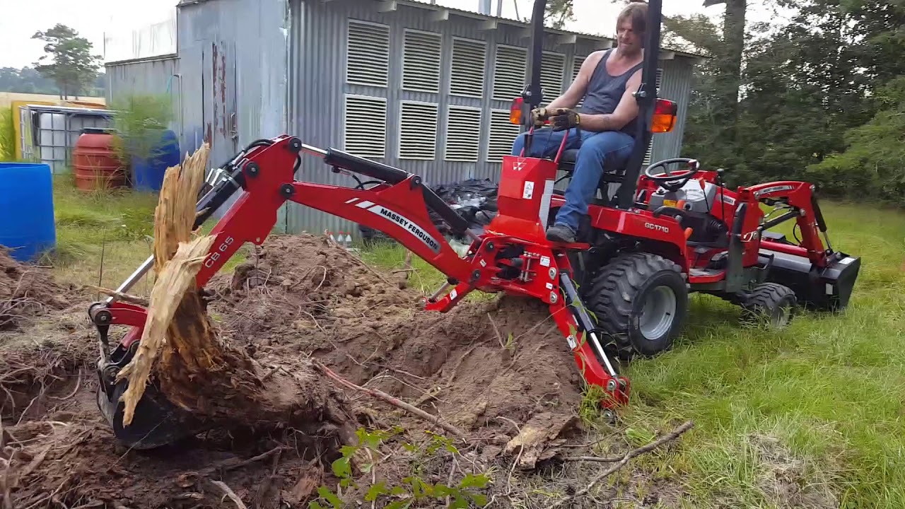 #20 Digging Up Stump With Massey GC 1710 TLB Backhoe