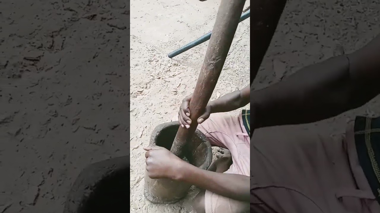 Pounding Ground Nuts With Mortar#villagelife#groundnut#mortar#african