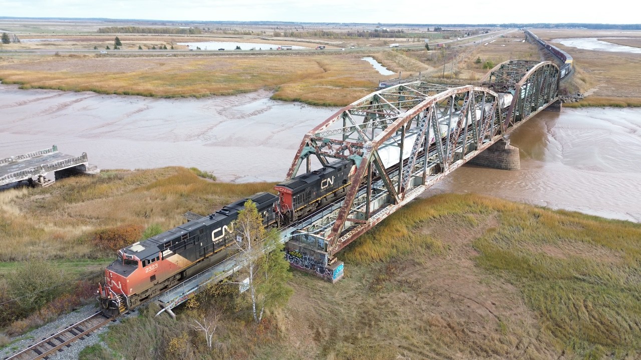 Awesome Aerial 4K View! Another Big Freight Train CN 507 Crossing Bridge into Sackville, NB