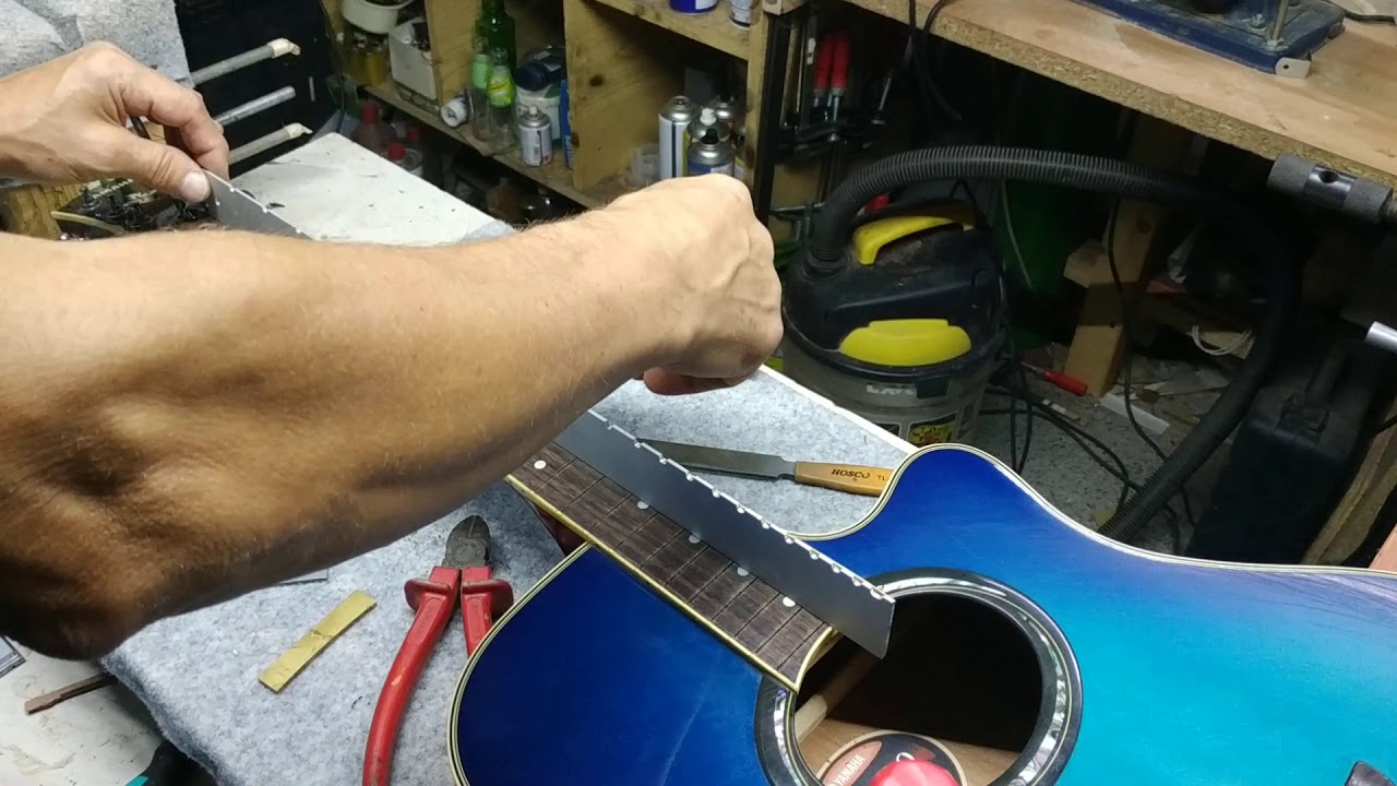 Refretting acustic guitar