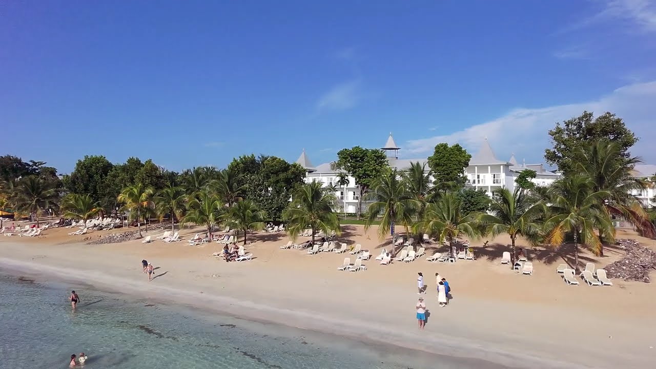 Bloody Bay beach in Negril, Jamaica , 4K, enjoying sunsets, with a mix of all-inclusive resorts 