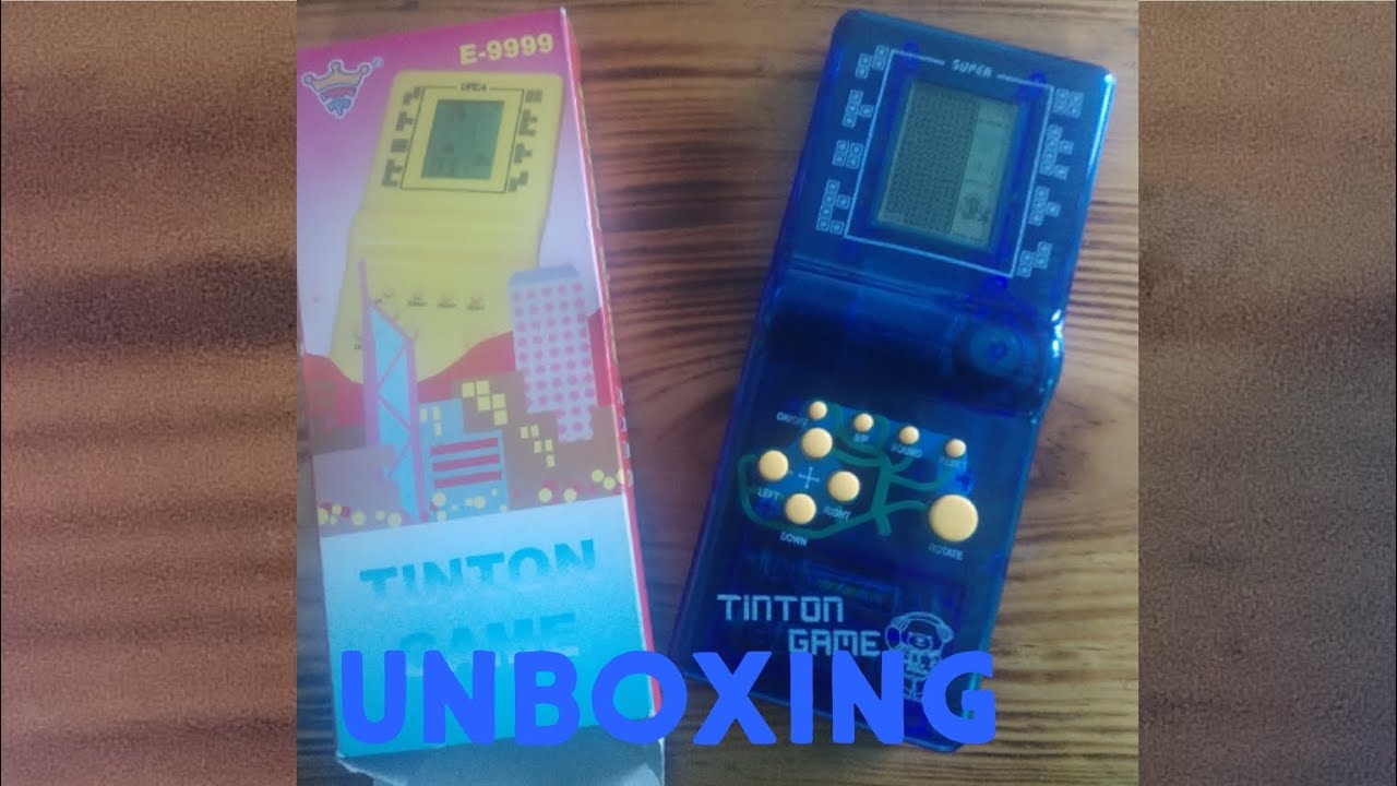 UNBOXING de un consola de juegos que es un “tinton game”