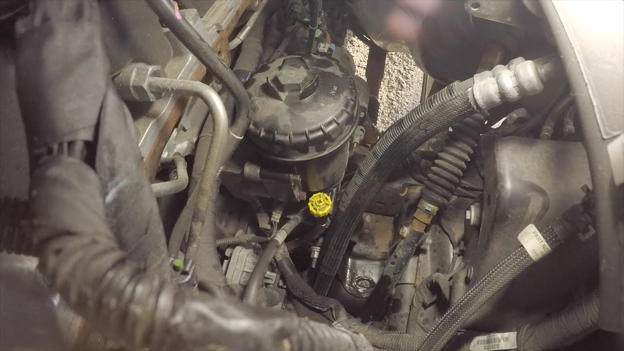 Как заменить топливный фильтр на двигателе Dodge Ram Cummins