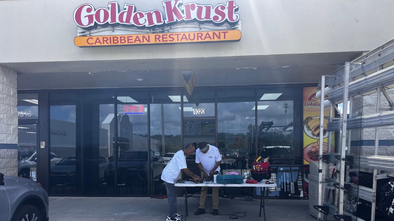 Golden Krust commercial door repair service Clermont , Florida