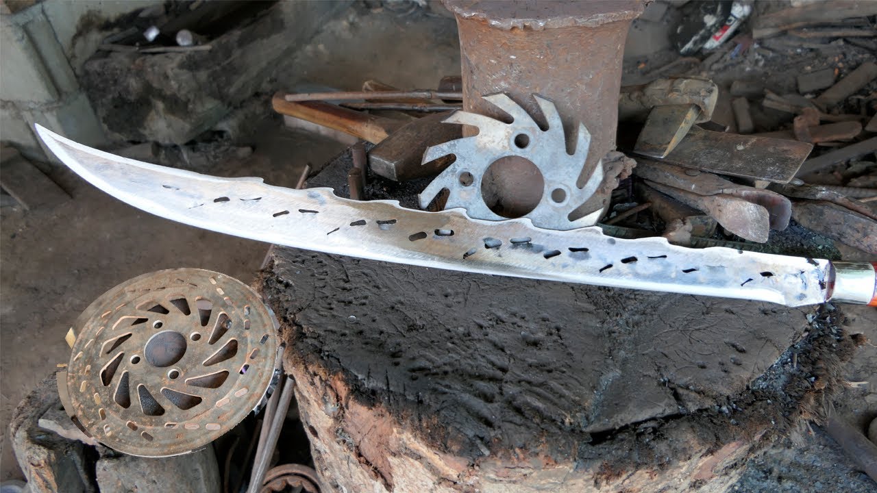 A NICE SWORD MADE FROM A MOTORCYCLE BRAKE DISC ROTOR ( NOT FOR SALE )