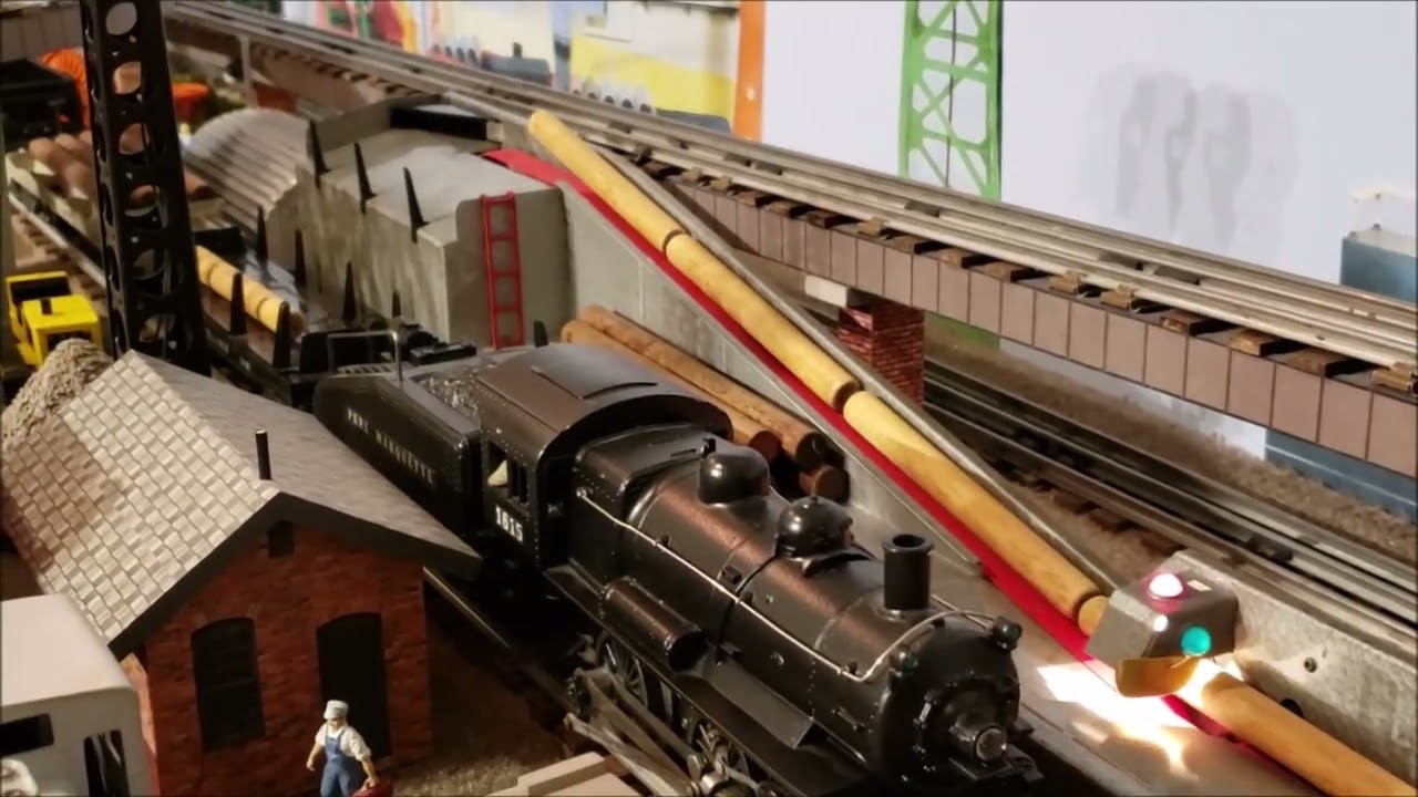 Lionel Postwar No. 364 Lumber Loader and No. 3461 Operating Lumber Car.