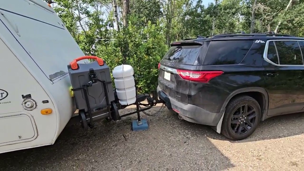 Towing camper with midsize SUV. Chevy Traverse towing travel trailer.